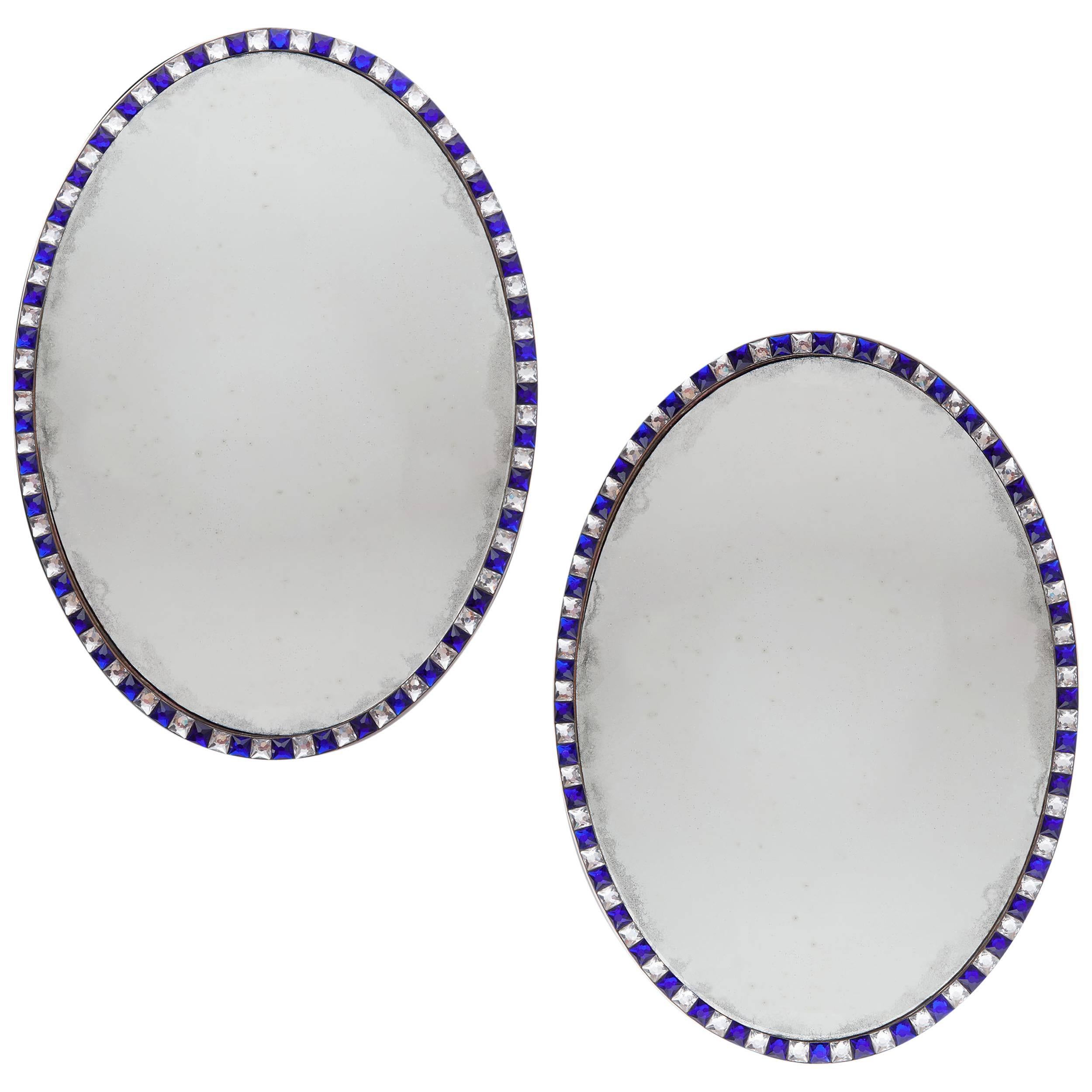 Pair of Blue Irish mid century Oval Mirrors