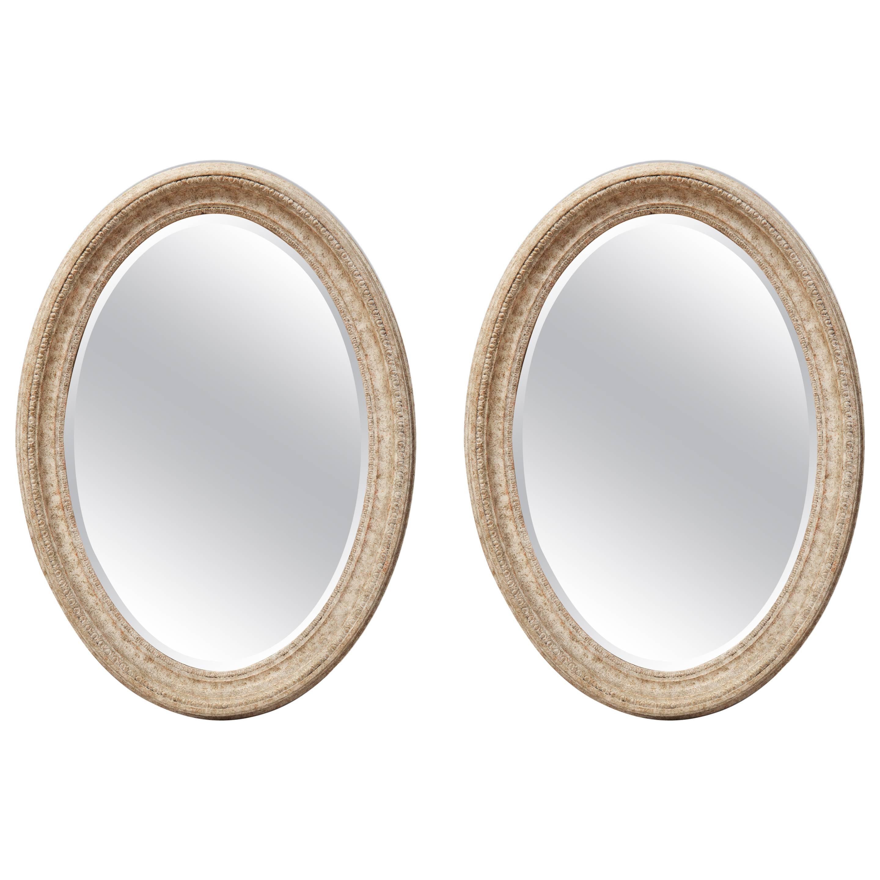 Pair of English Oval Painted Mirrors