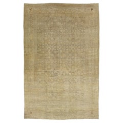 Tapis persan ancien Tabriz en laine beige avec designs floraux classiques