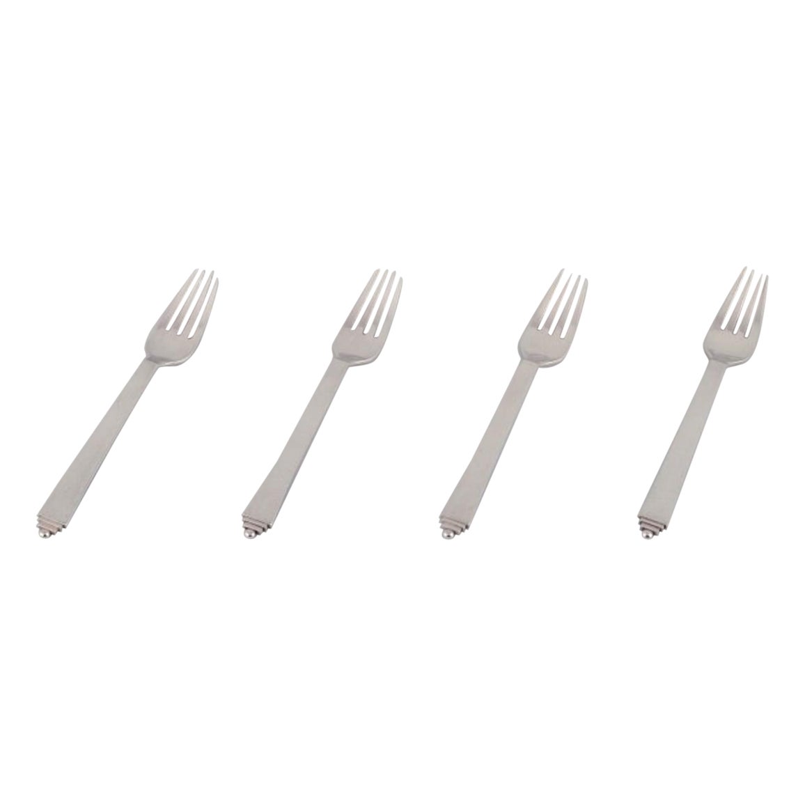 Piramide di Georg Jensen. Quattro forchette da pranzo in argento sterling. 1933-1944.