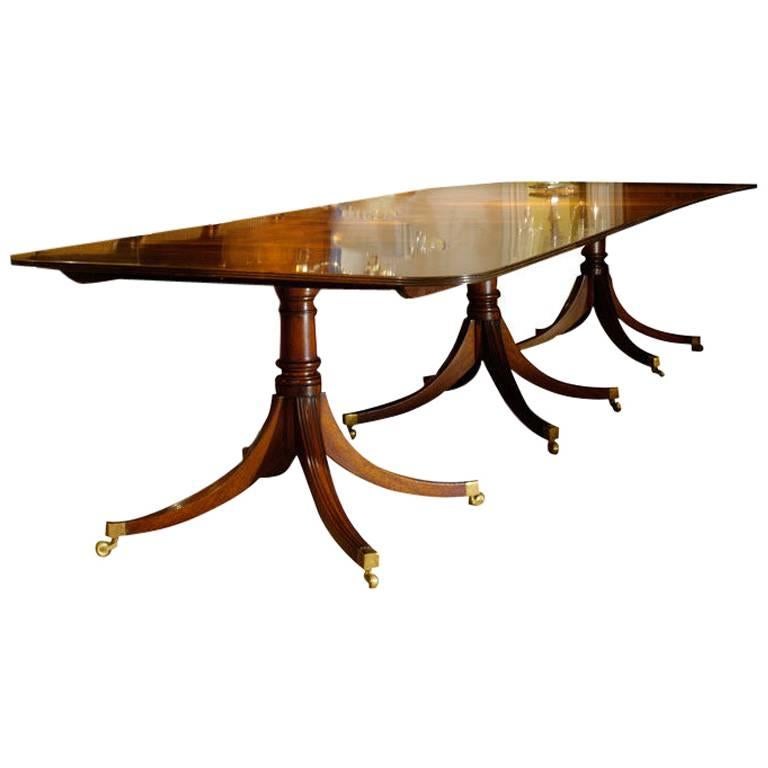 Handmade Three-Pedestal Solid Mahogany Dining Table with Two Leaves For Sale