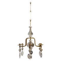 Pair of gilt iron chandeliers Erik Hoglund Sweden 1970