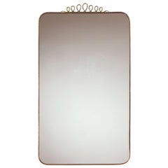Italian brass mirror in the style of Gio Ponti, italy, early 1960s