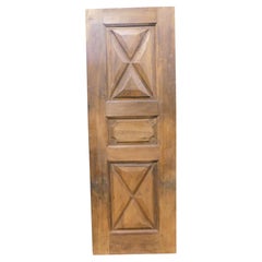 Antique Single panel door in walnut, carved in diamond, Italy