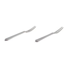 Pirámide Georg Jensen. Dos tenedores para embutidos en plata de ley.