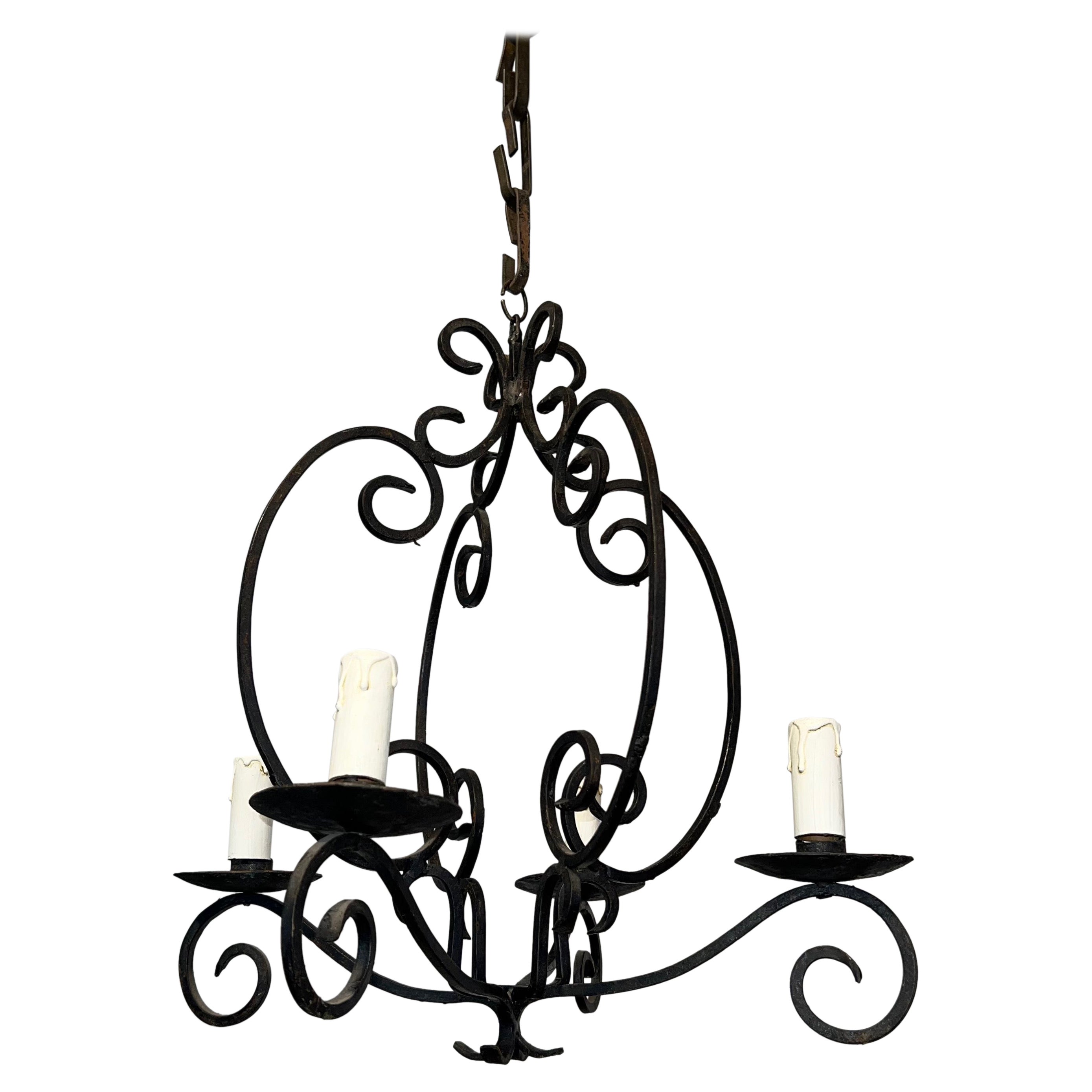 4 Lights Wrought Iron Chandelier. French Work. Circa 1950