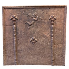 Plaque de cheminée / dosseret "Cupidon" d'époque Louis XIV du 18e siècle