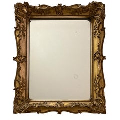 Rococo style gilt gesso rectangular wall mirror