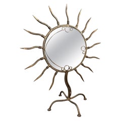 Vintage postmodern American gilt iron sunburst table mirror, c1980s.