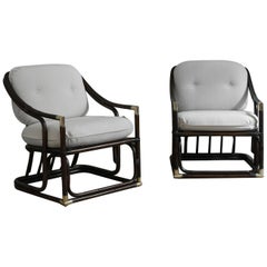 Pair of dark-finish curved bamboo armchairs with brass details - late 1960s