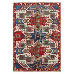 Tapis tribal turc vintage rouge et bleu avec médaillons par Rug & Kilim