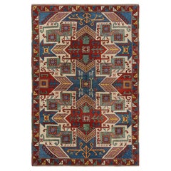 Tapis tribal turc vintage rouge et bleu avec médaillons par Rug & Kilim