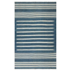Rug & Kilim’s Contemporary Dhurrie Rug with Blue and off-White Geometric Stripes