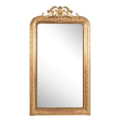 Elegant 19th-century French gilded wood mirror with floral motifs
