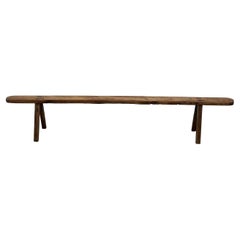 Very large old french farm bench in solid walnut