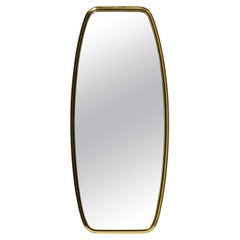 Original Mid Century wall mirror with heavy brass frame by Münchener Zierspiegel