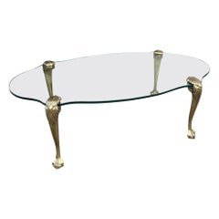 Mid Century Brass Claw and Ball Glass Cocktail Table