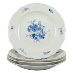 Meissen, four dinner plates in porcelain with floral motifs and insects