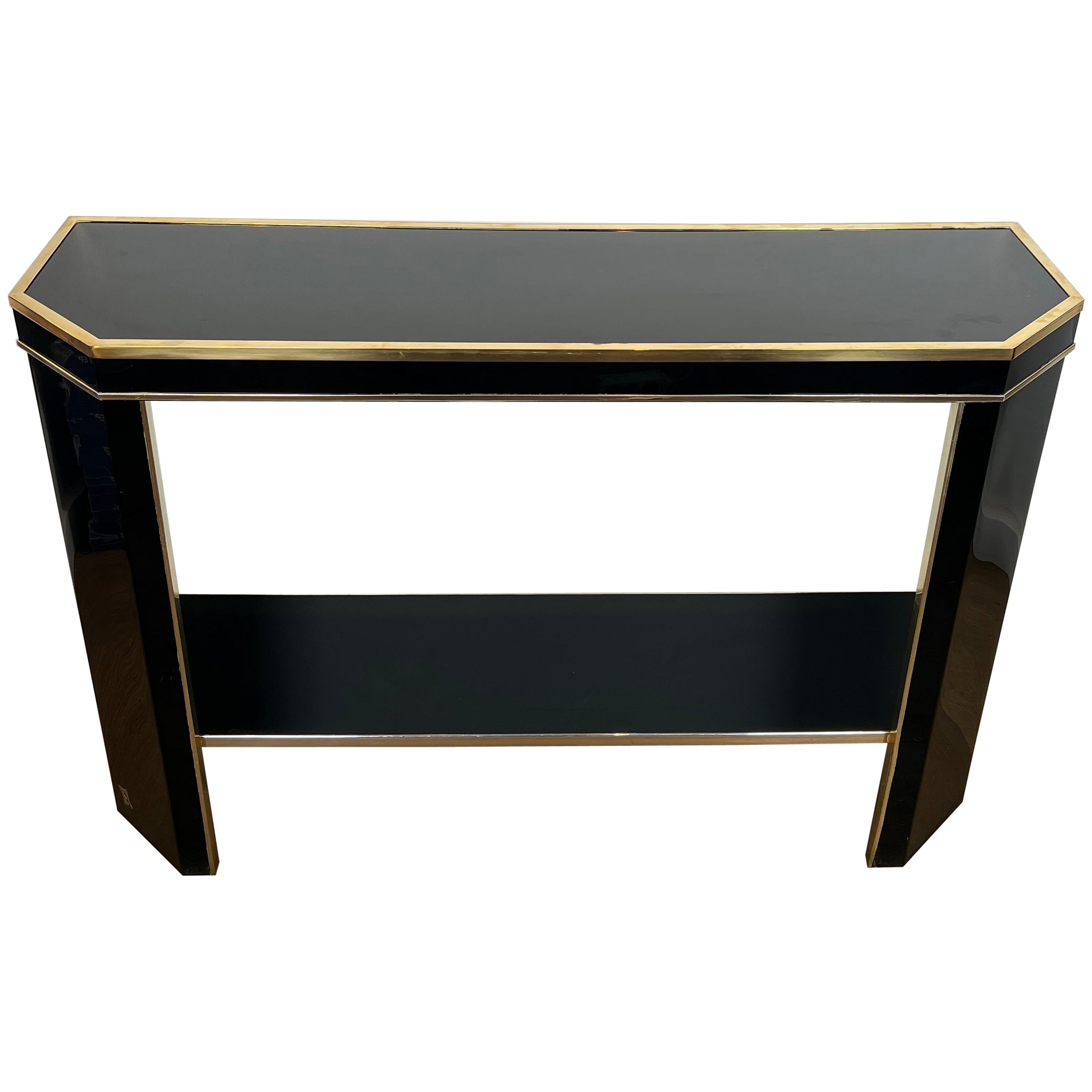 Consola de metal lacado en negro y dorado firmada por el diseñador francés Jean-Claude Mahey en venta