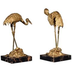 Brass Cranes on Black Marble Bases