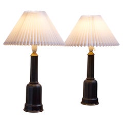 Pair of black porcelain and brass 'Heiberg' table lamps, Denmark, 1930's