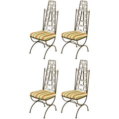 Four Spanish Revival Wrought Iron Filigree Dining Chairs