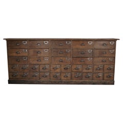 Vintage Industrial Large French Oak Hardware Store Apothecary Cabinet, 1920/1930s