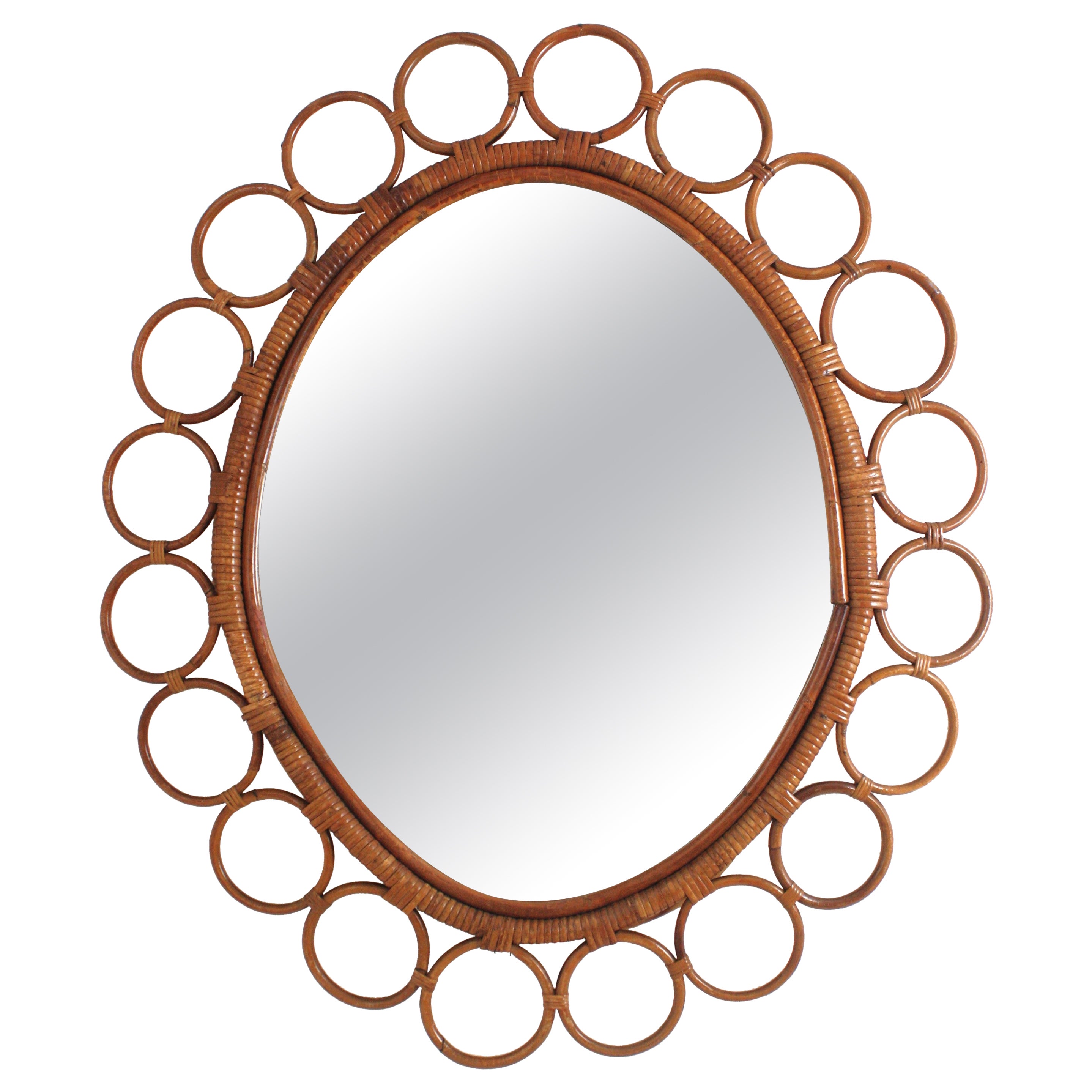 Grande specchio ovale in rattan spagnolo con cornice ad anelli
