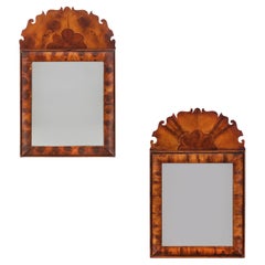 A Pair of Oyster Veneered Cushion Frame Pier Mirrors