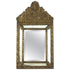French Napoleon III Brass Repousse Mirror with Beveled Glass