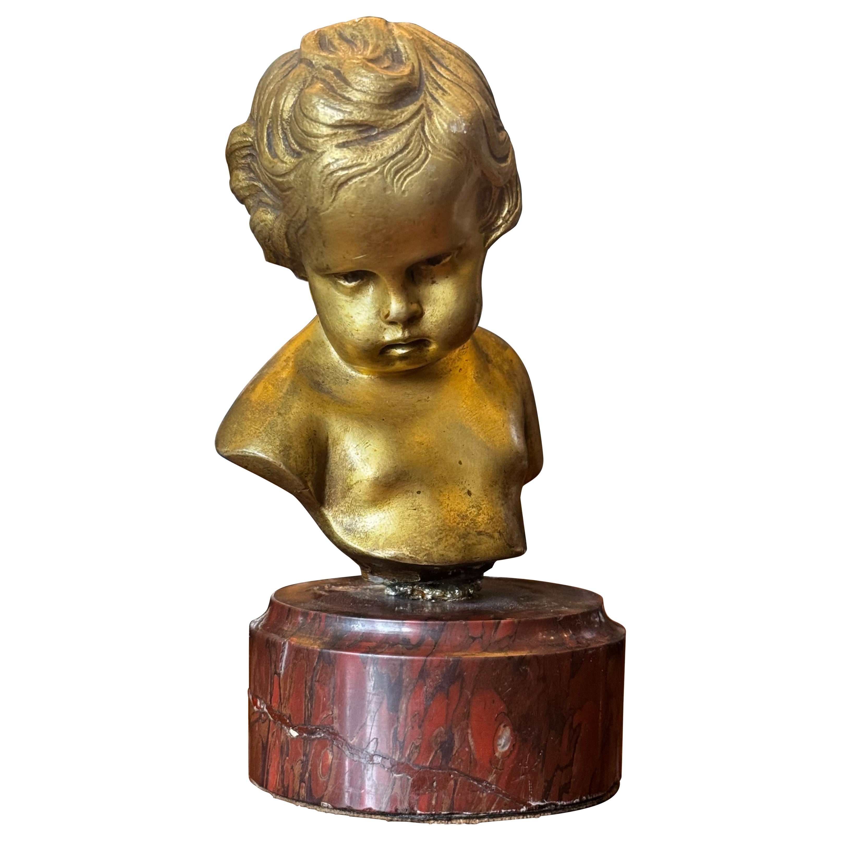 Busto de bronce de un niño de finales del siglo XIX firmado Francois