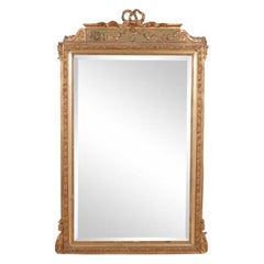 Specchio francese del XIX secolo in legno dorato intagliato