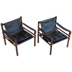 Pair of Rosewood and Leather Arne Norell Safari Lounge Chairs