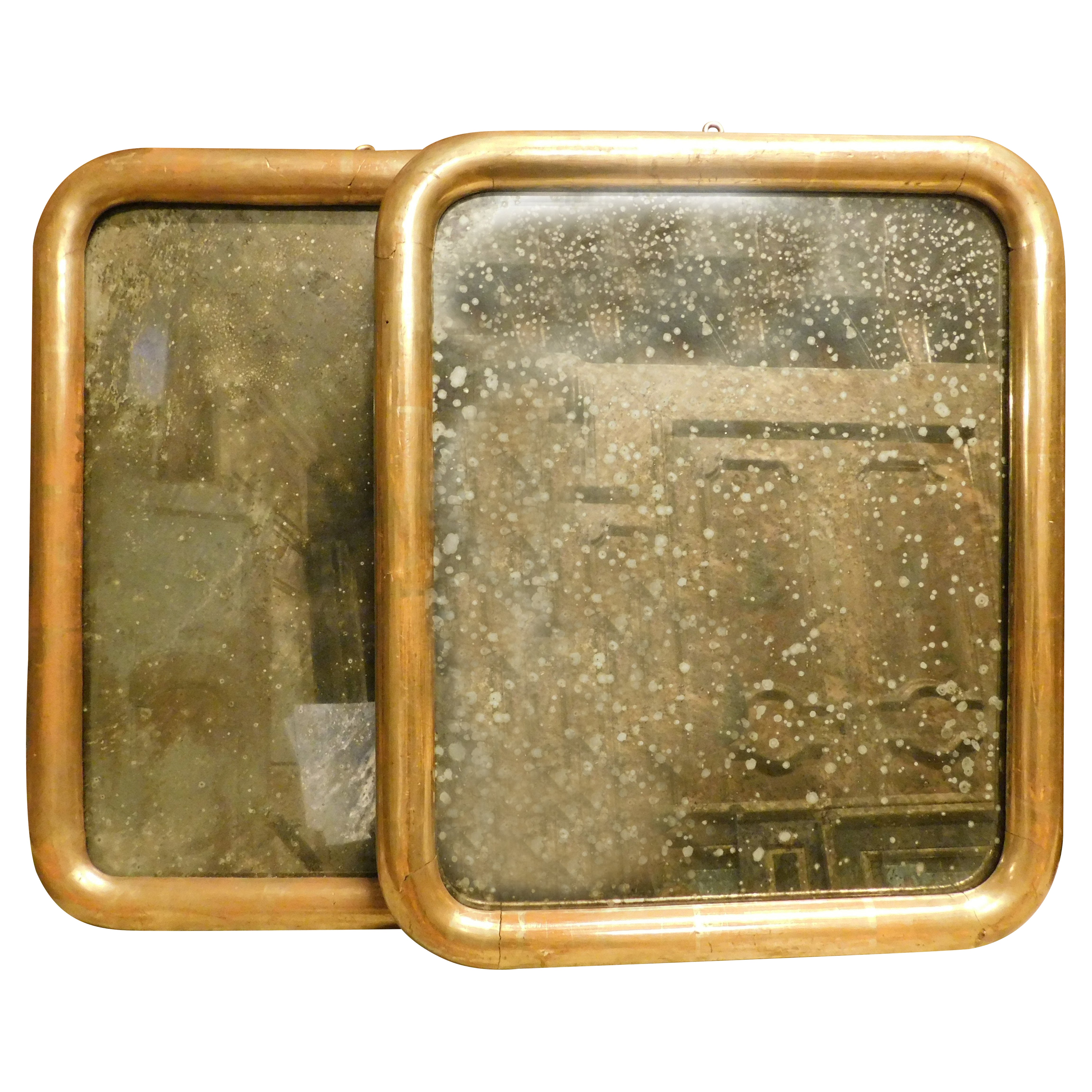 Paire de miroirs simples en bois doré, Italie