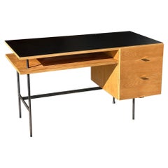 Vintage 1950s desk in the Pierre Paulin style.