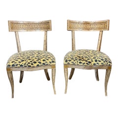 Pareja de sillas italianas de madera dorada plateada