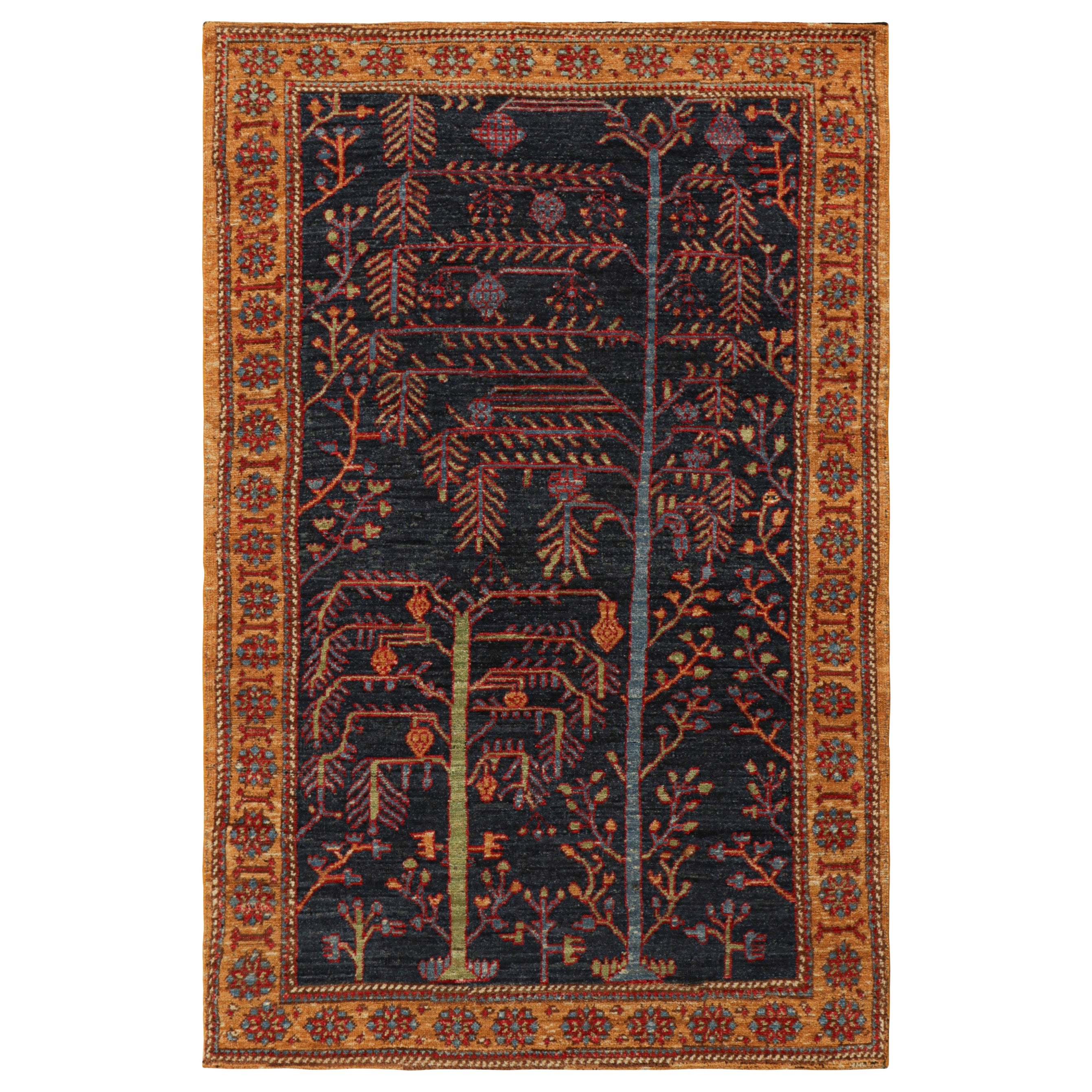 Alfombra persa de estilo tribal Rug & Kilim en azul marino, con motivos florales