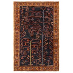 Rug & Kilim's Persian Tribal Style Rug in Navy Blue, with Floral Patterns (tapis persan de style tribal en bleu marine avec motifs floraux)