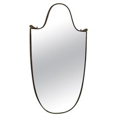 Mid-century modern solid brass shield shape mirror, Italy, 1960s