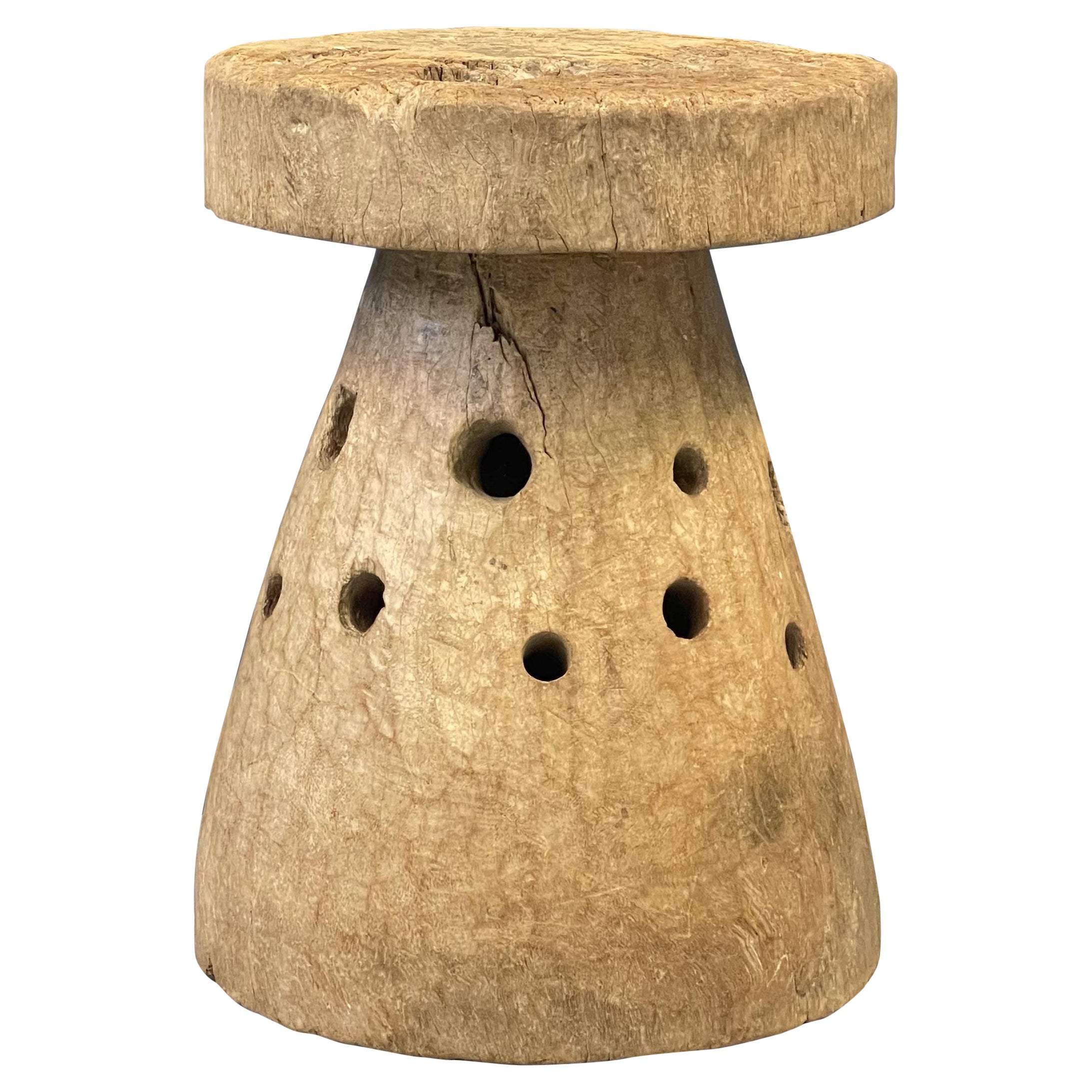 Large African mortar made of one solid wooden trunk