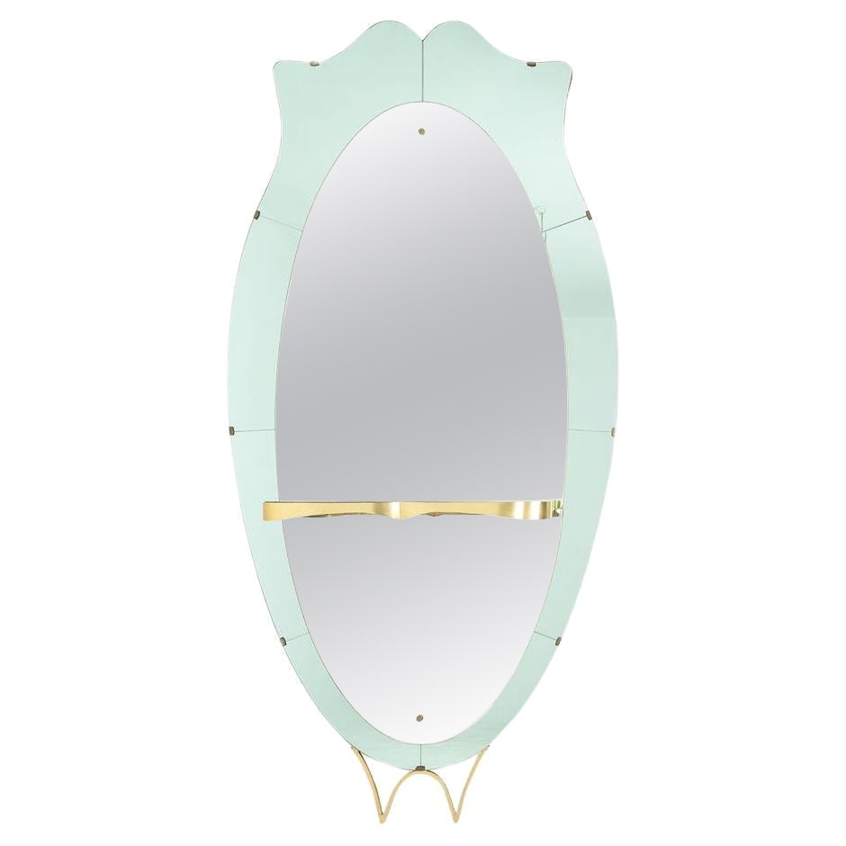 Miroir console en verre bicolore et laiton doré. Vers 1950. en vente