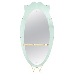 Specchio consolle in vetro bicolore e ottone dorato. Circa 1950.