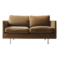 Sofá con patas de acero tubular de Benjamin Thompson para Design Research Inc.