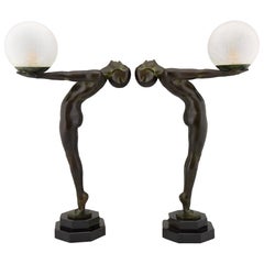 Pareja de lámparas de estilo Art Déco Lumina Escultura desnuda de pie Max Le Verrier