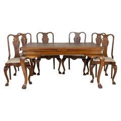 Extendable Oak Table with Chairs and Armchairs from the Early 20th Century