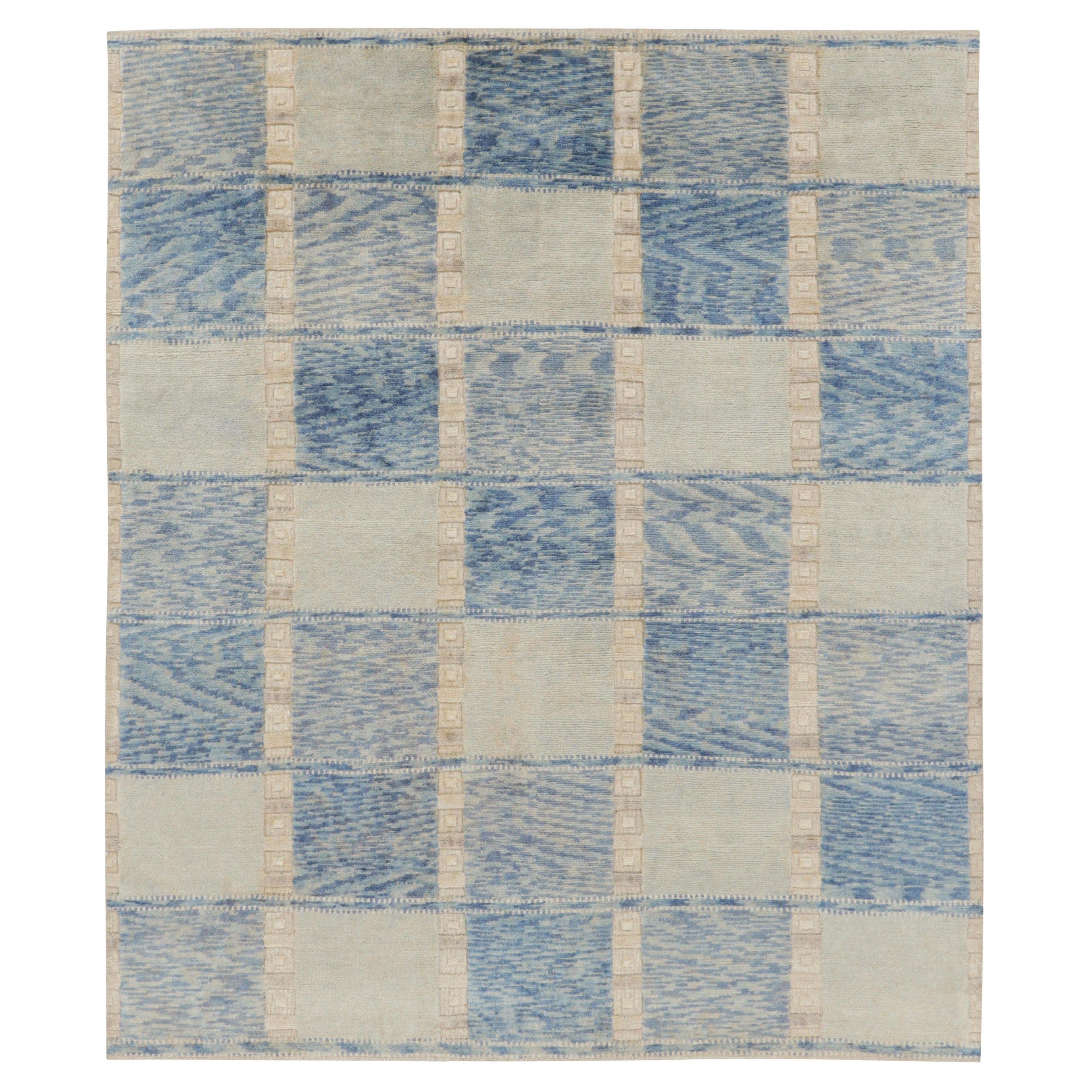 Alfombra de estilo escandinavo de Rug & Kilim en azul y crema con motivos geométricos
