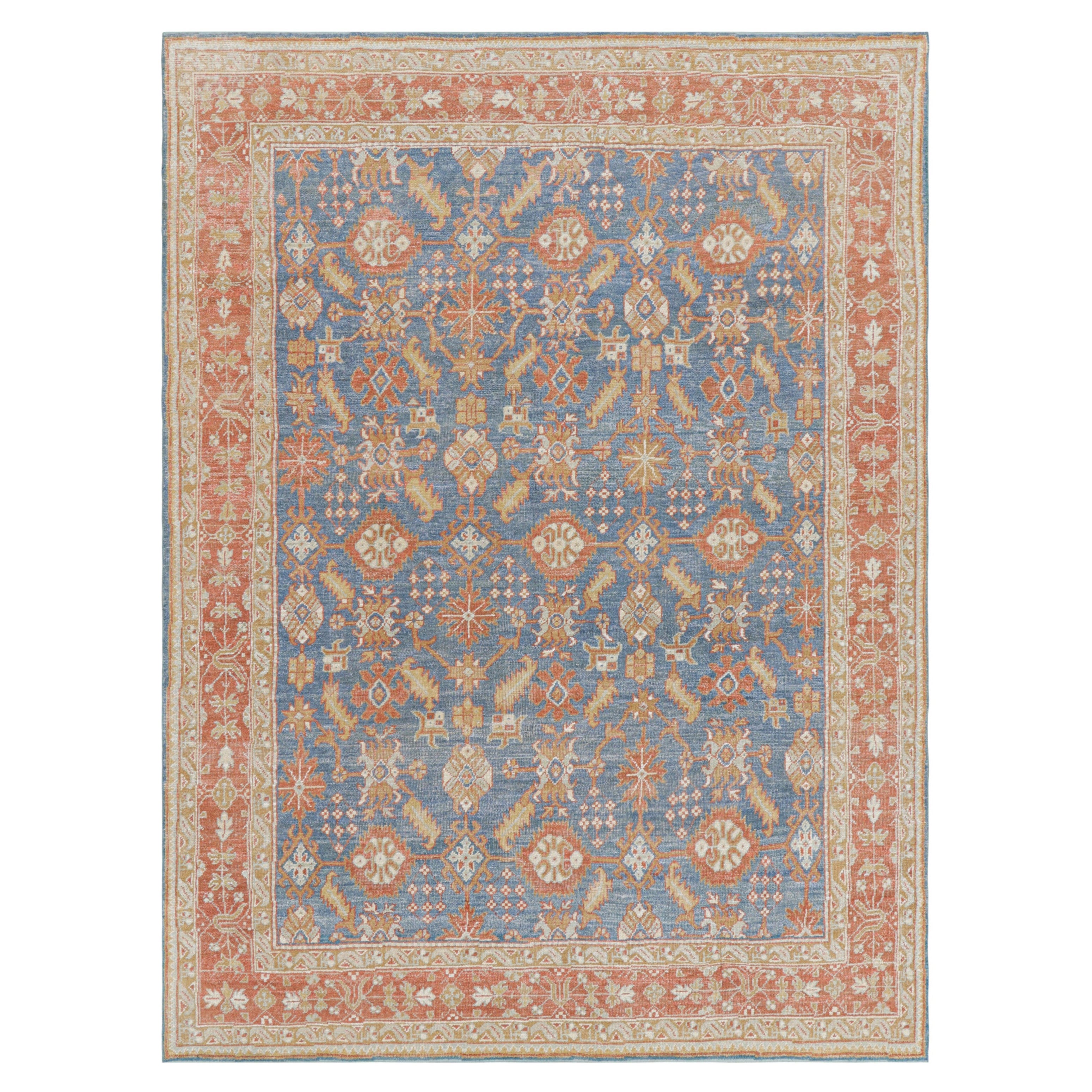 Rug & Kilim’s Oushak Rug in Blue and Red with Geometric Floral Patterns