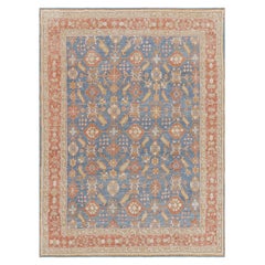 Rug & Kilim's Oushak Rug in Blue and Red with Geometric Floral Patterns (tapis Oushak bleu et rouge à motifs floraux géométriques)