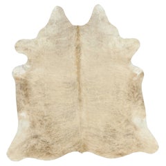 Rug & Kilim’s Large Cowhide Rug in Sandy Beige-Brown and Cream Tones