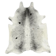 Rug & Kilim’s Large Cowhide Rug in White with Black and Gray Accents